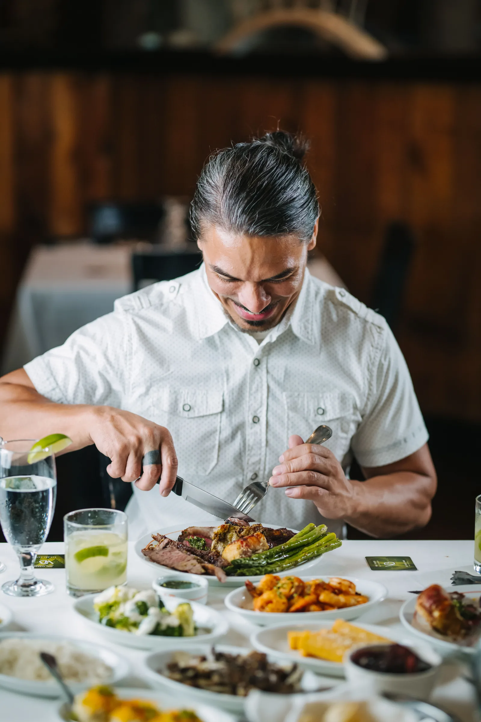 Guest enjoying a Brazilian Rodizio meal at VB Steakhouse